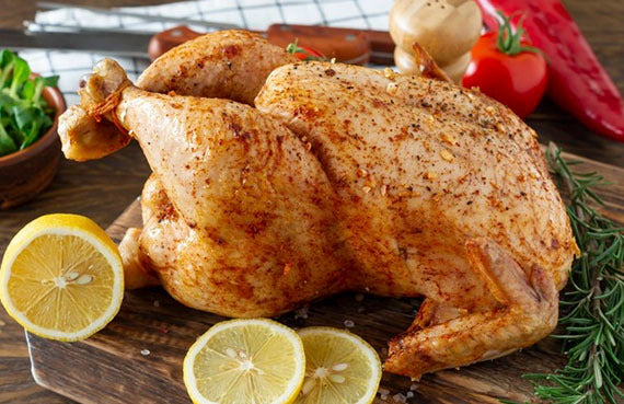 Pollo entero con limón y finas hierbas a presión