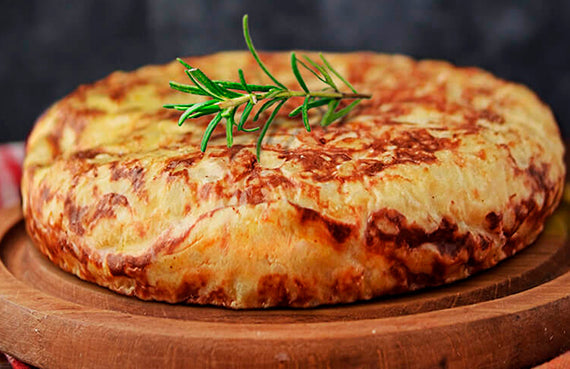 Tortilla de papa con queso y tocino a presión