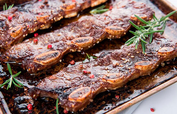 Asado de tira al vino tinto y pimienta a presión